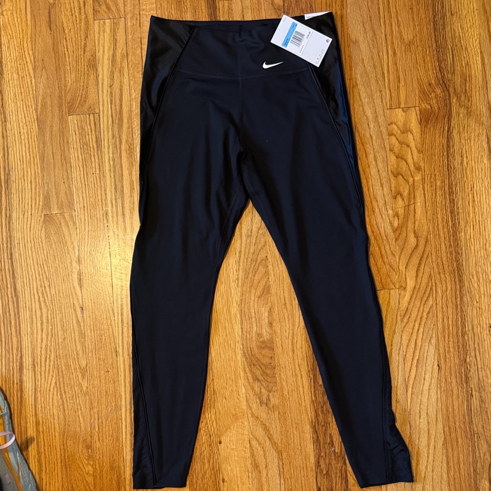 Nike women’s black Leggings with White Logo